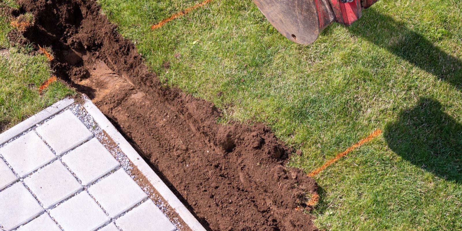 Querschnitt durch einen Leitungsgraben mit verlegter Leitung